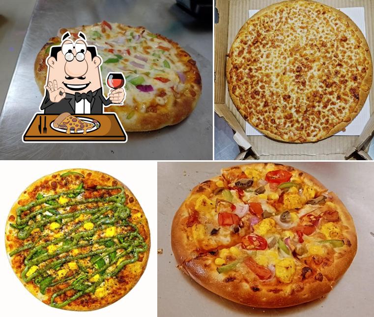 Try out pizza at Burger wings cafe