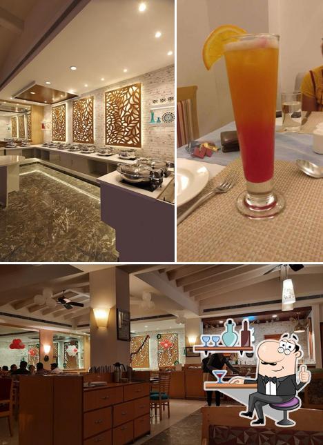 Take a seat at one of the tables at Marigold Restaurant Bar & Pub Take a seat at one of the tables at Marigold Restaurant Bar & Pub