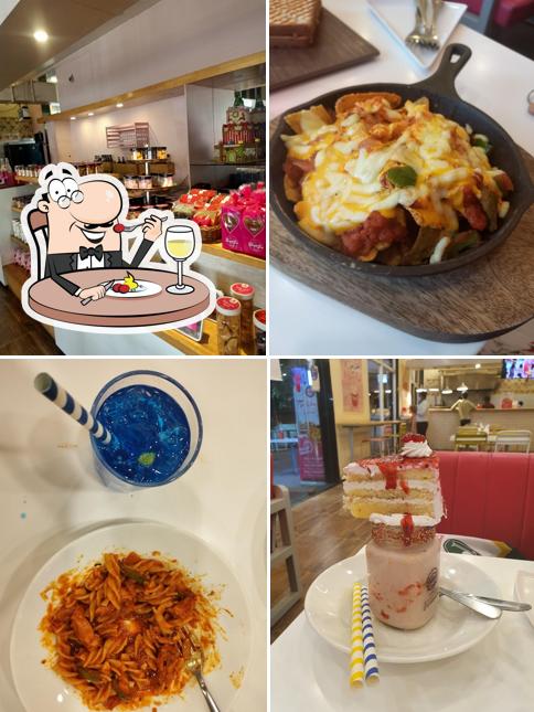 Food at Puppy's Bakery Desserts Birthday Cakes Pizza Burger Shakes Madurai