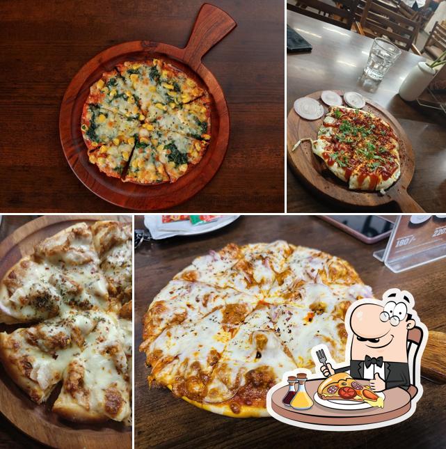 Order pizza at Cafe Miles By Kisan Tyres