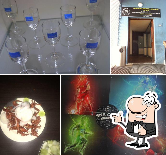 Look at the photo of Sns Club