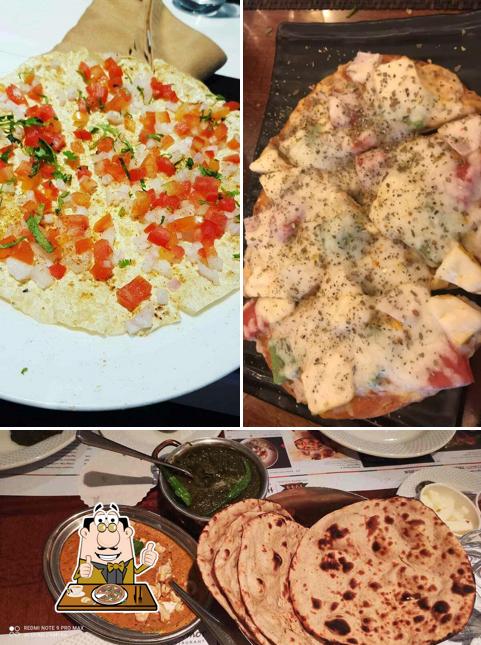 Pick pizza at 1944 The Hocco Kitchen (Navrangpura)