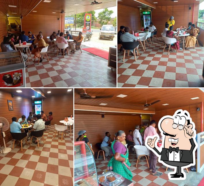 Take a seat at one of the tables at Sri Aradana cafe
