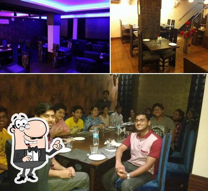 Among different things one can find interior and dining table at Nizam E Khaas