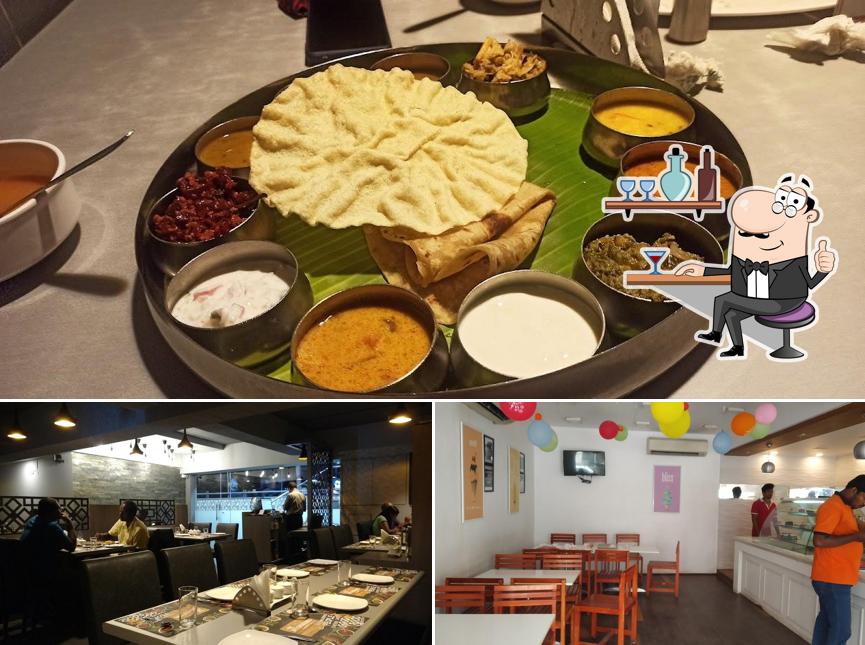 Take a seat at one of the tables at All Seasons vegetarian Delicacies