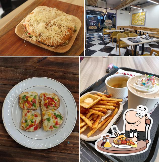 Order pizza at Harmony RestoCafe - Best Restaurant in Navrangpura Best Multi-Cuisine Restaurant Best Gujrati Restaurant in Navrangpura