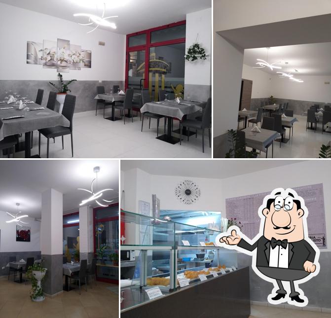 Dai un'occhiata agli interni di L'Altro Gusto Pizzeria e Tavola Calda Siciliana