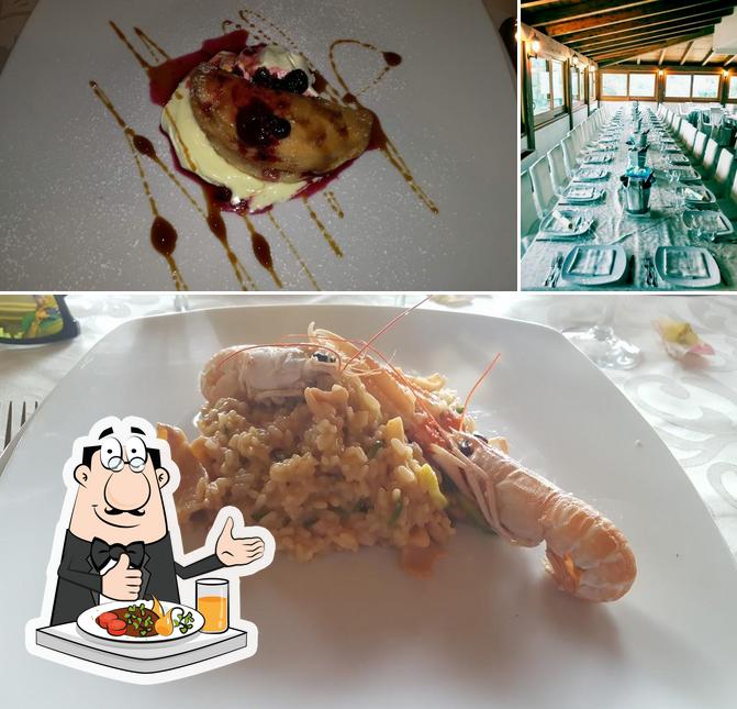 La immagine della cibo e tavolo da pranzo di Villa Riccio Albergo & Location Eventi