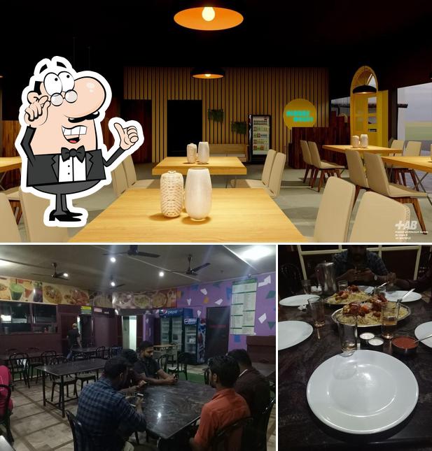 The image of Nibras Mandi Family Restaurant’s interior and dining table