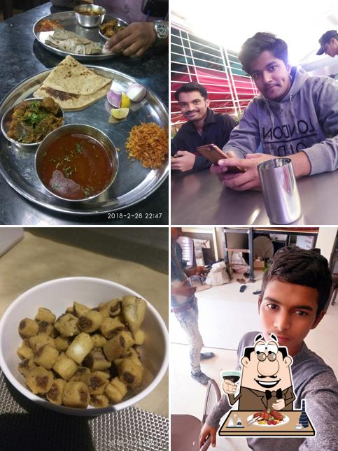 Meat dishes are served at SANGRAM RESTAURANT & BAR