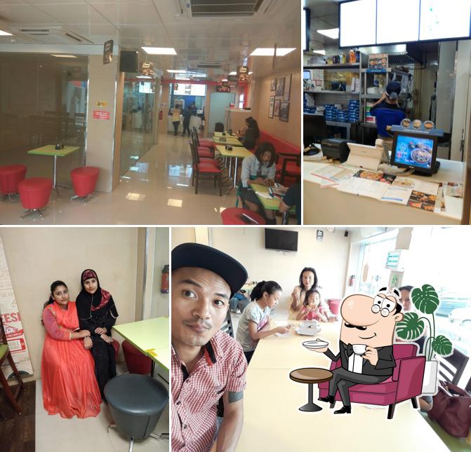 Take a seat at one of the tables at Domino's Pizza Forest Colony, Near City Tower, Dimapur