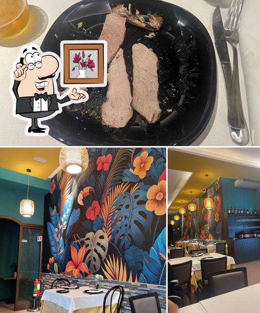 Questa è la foto che presenta la interni e cibo di Ipanema Grill