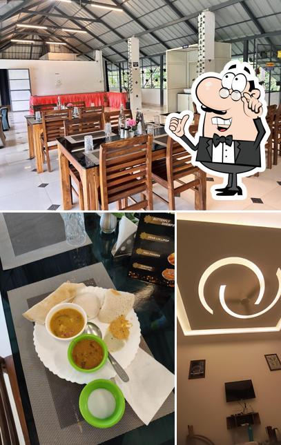 Among various things one can find interior and food at PVR Grande Resort, Munnar