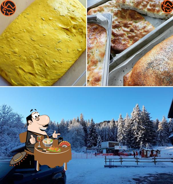 Dai un’occhiata alla immagine che presenta la cibo e esterno di Bar Ristorante Affittacamere "Mendel Stube"