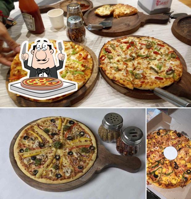 Pick pizza at Caldo's Cafe & Multi-Cuisine Restaurant