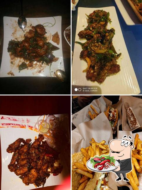 Get different seafood dishes offered by Gilly’s 104 Bar