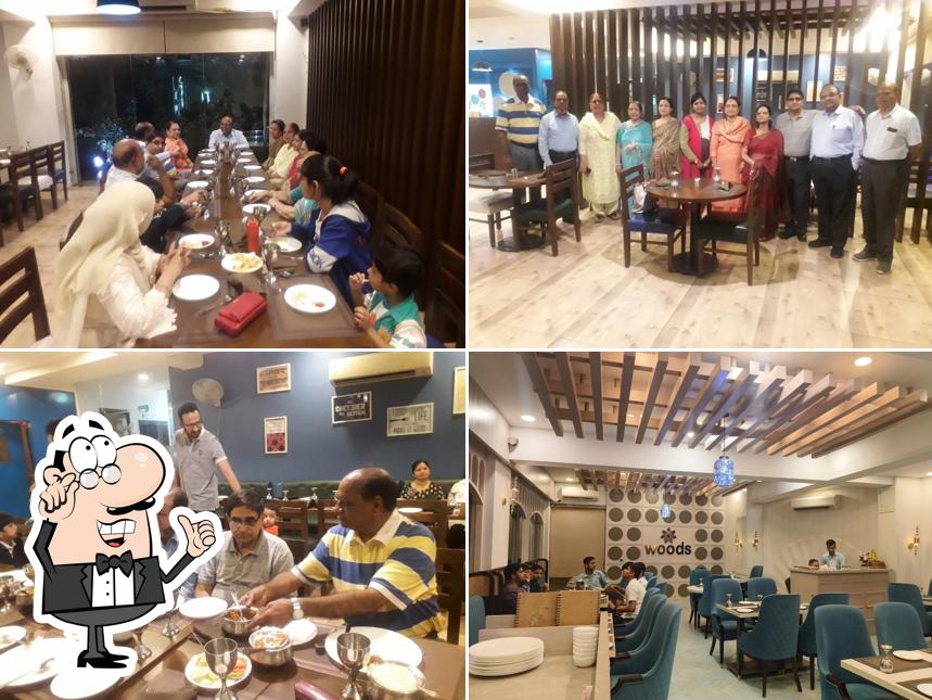 Take a seat at one of the tables at Woods Restaurant