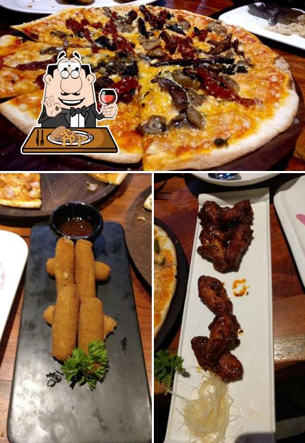 Try out pizza at Yes Minister Bowling, Bar & Kitchen