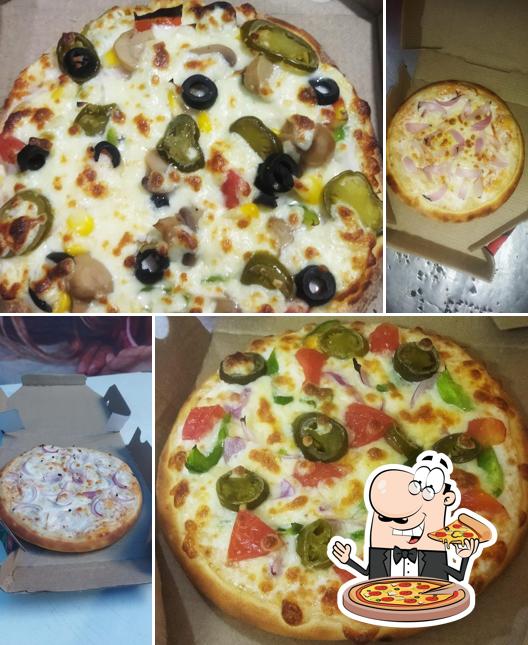 Try out pizza at Slice Pizza