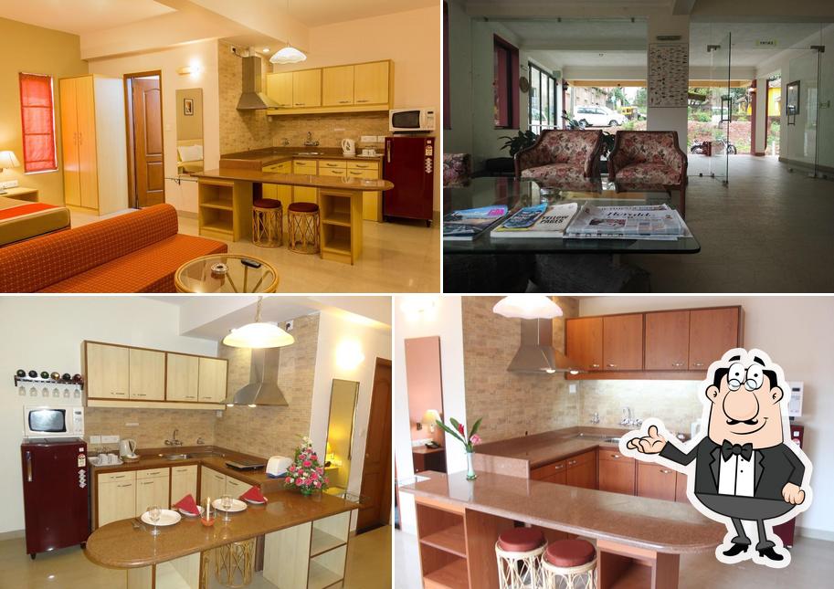 Take a seat at one of the tables at Casa Amarilla/Hotel Sangria