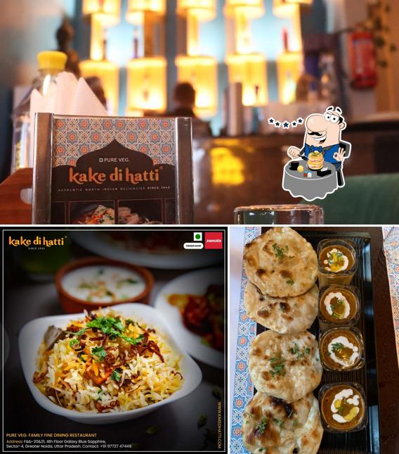 Take a look at the image displaying food and interior at Kake Di Hatti Greater Noida West