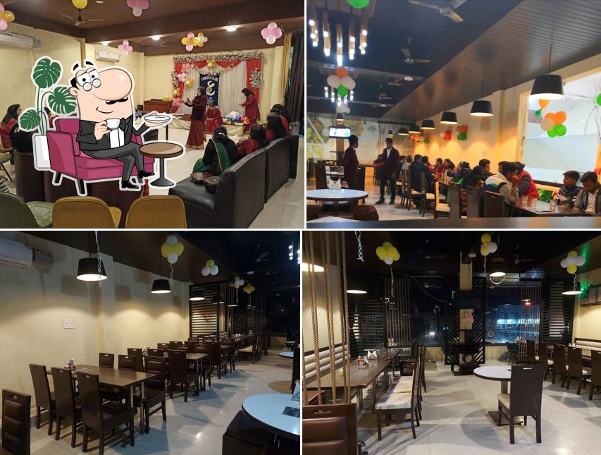 Take a seat at one of the tables at Vyanjan Vatika 'City Point