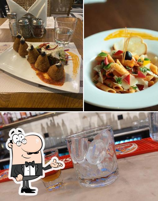 Take a look at the photo displaying interior and food at Caffè Tonino (IGI)