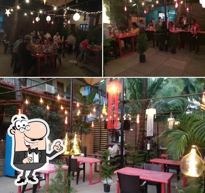 Take a seat at one of the tables at Cafe Capricorn & Beach House