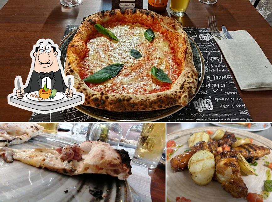 Platti al Pizzeria L’ Avvelenata-La Taverna Dei Cantautori