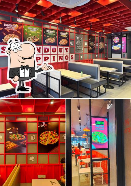 The picture of interior and food at Ovenstory Pizza