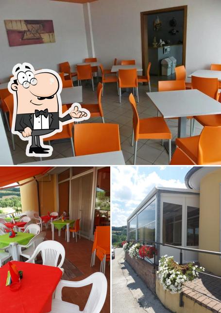 Pizzeria Tazmania si caratterizza per la interni e tavolo da pranzo