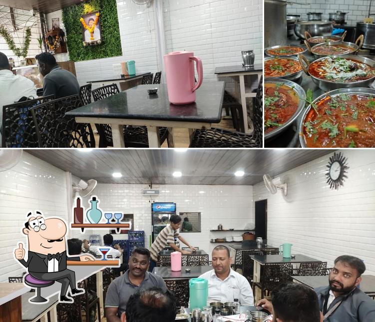Take a look at the image showing interior and food at Hotel Sai Lunch Home