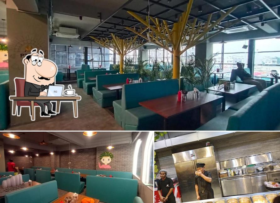 Take a seat at one of the tables at Inferno Pizza