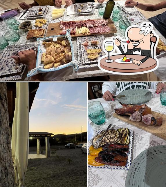 Guarda la foto che presenta la cibo e esterno di Home Restaurant Marongiu