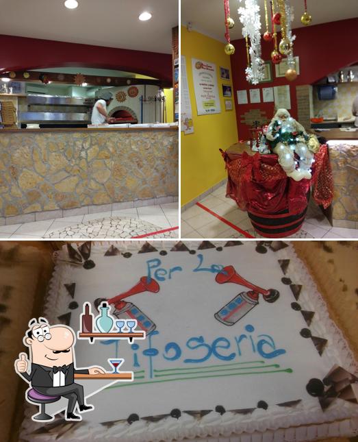 La immagine di interni e torta da Pizza Export Bella Stigliano sas di’ Toniolo Tomas & C