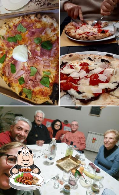 Questa è la foto che mostra la cibo e interni di Italy inn Corso Svizzera 38