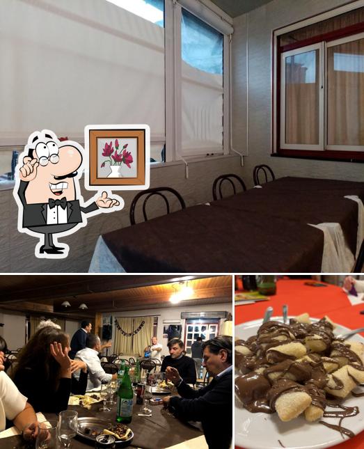 Dai un'occhiata agli interni di Trattoria Pizzeria Il Vicoletto