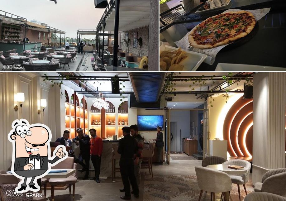 The restaurant's interior and pizza