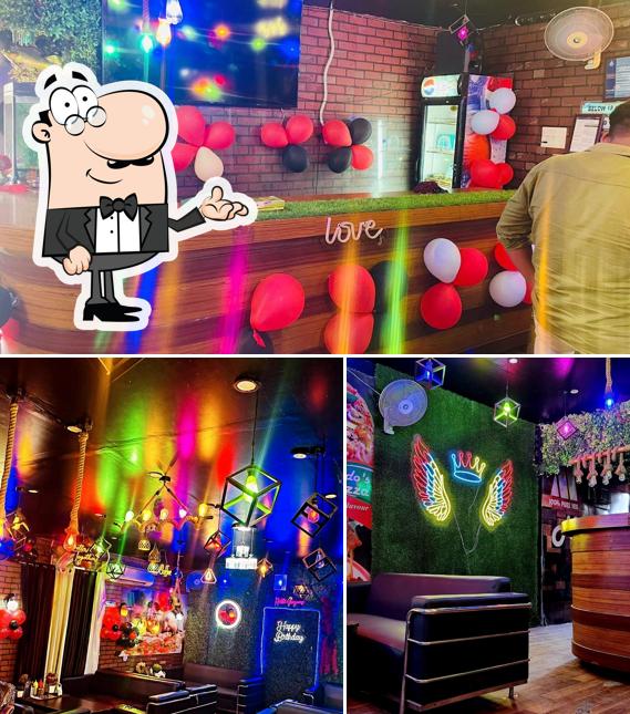 The image of interior and food at The Golden Cafe