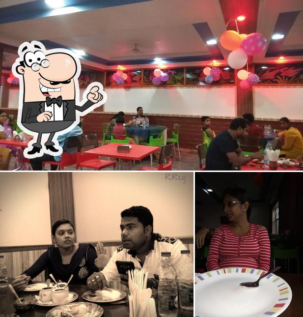 Take a seat at one of the tables at S.K. Restaurant