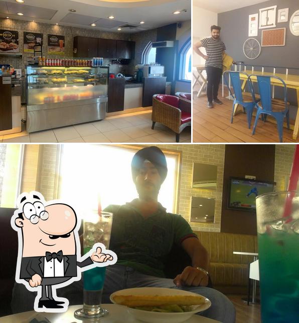 Cafe Coffee Day - Check Post is distinguished by interior and food