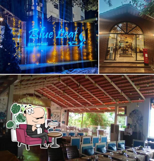 Take a seat at one of the tables at Hotel Blue Leaf