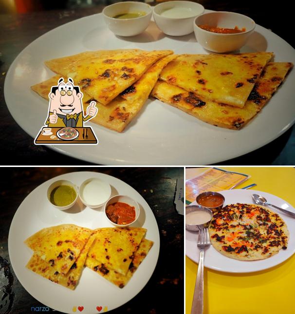 Pick pizza at Lemon - Veg Restaurant