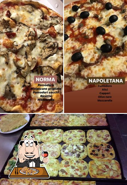 Prenditi una pizza a Pizzeria Ristorante Itaca