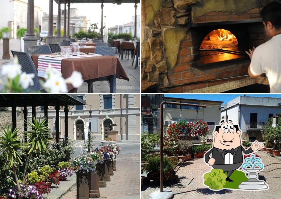 Guarda la immagine che presenta la esterno e interni di Ristorante Pizzeria Piazza Tre Canali