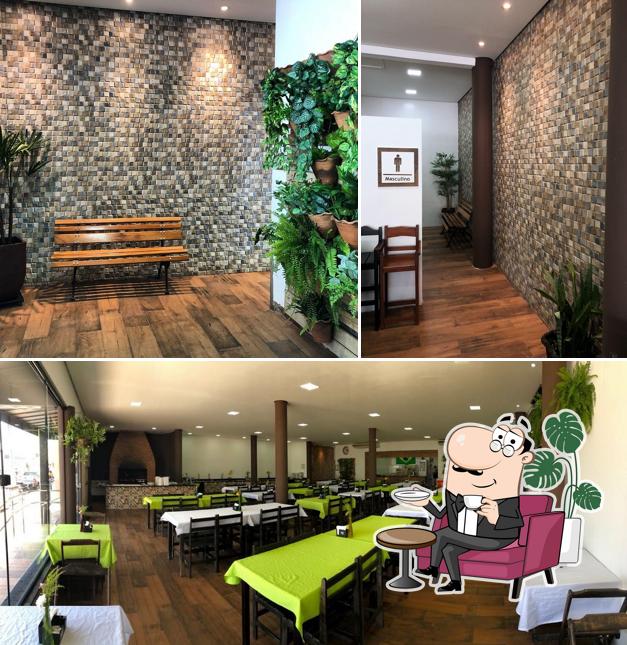 O interior do Restaurante Na Brasa