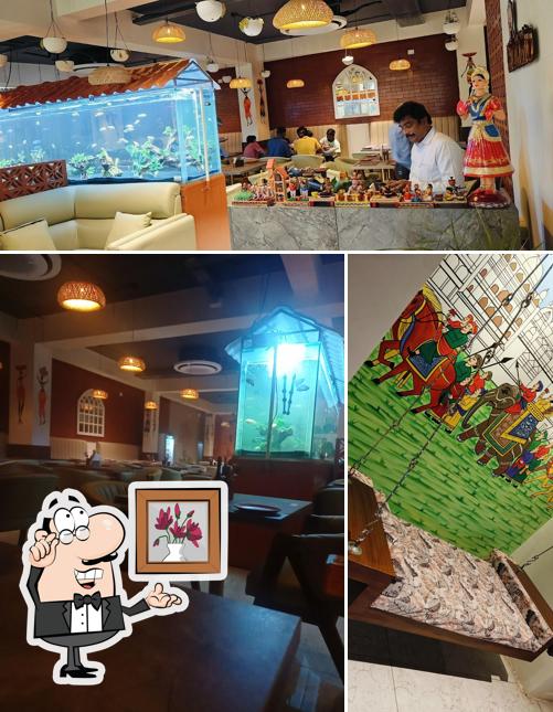 Check out how KUNDANAM AUTHENTIC TELUGU KITCHEN AND BANQUETS looks inside