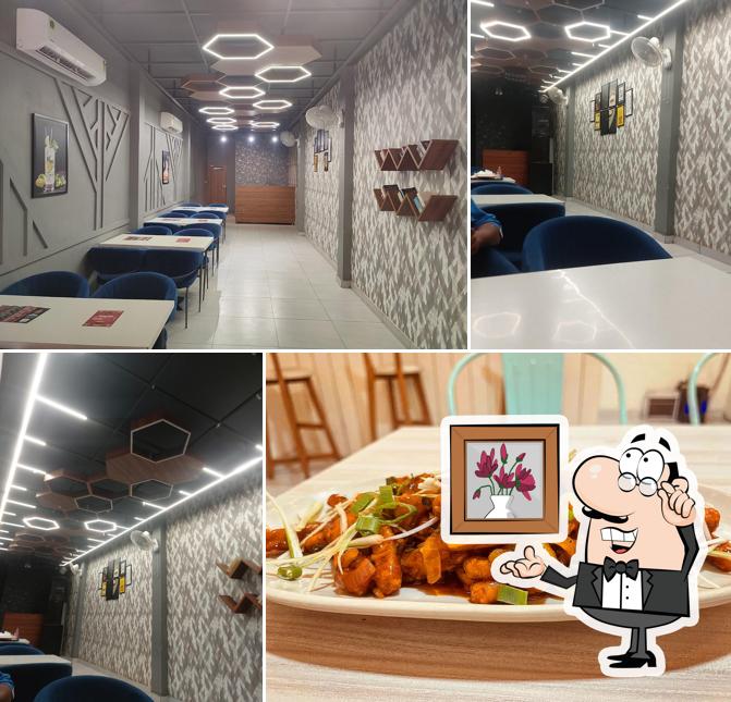 Take a seat at one of the tables at Grill Masters Jagadhri