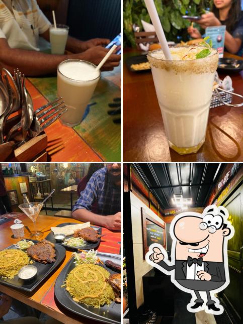 Among various things one can find interior and drink at The Po’Boys Grill Athirampuzha, kottayam