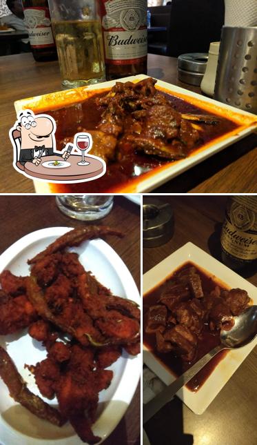 Take a look at the image showing food and beer at Menaka Bar & Family A/c Restaurant